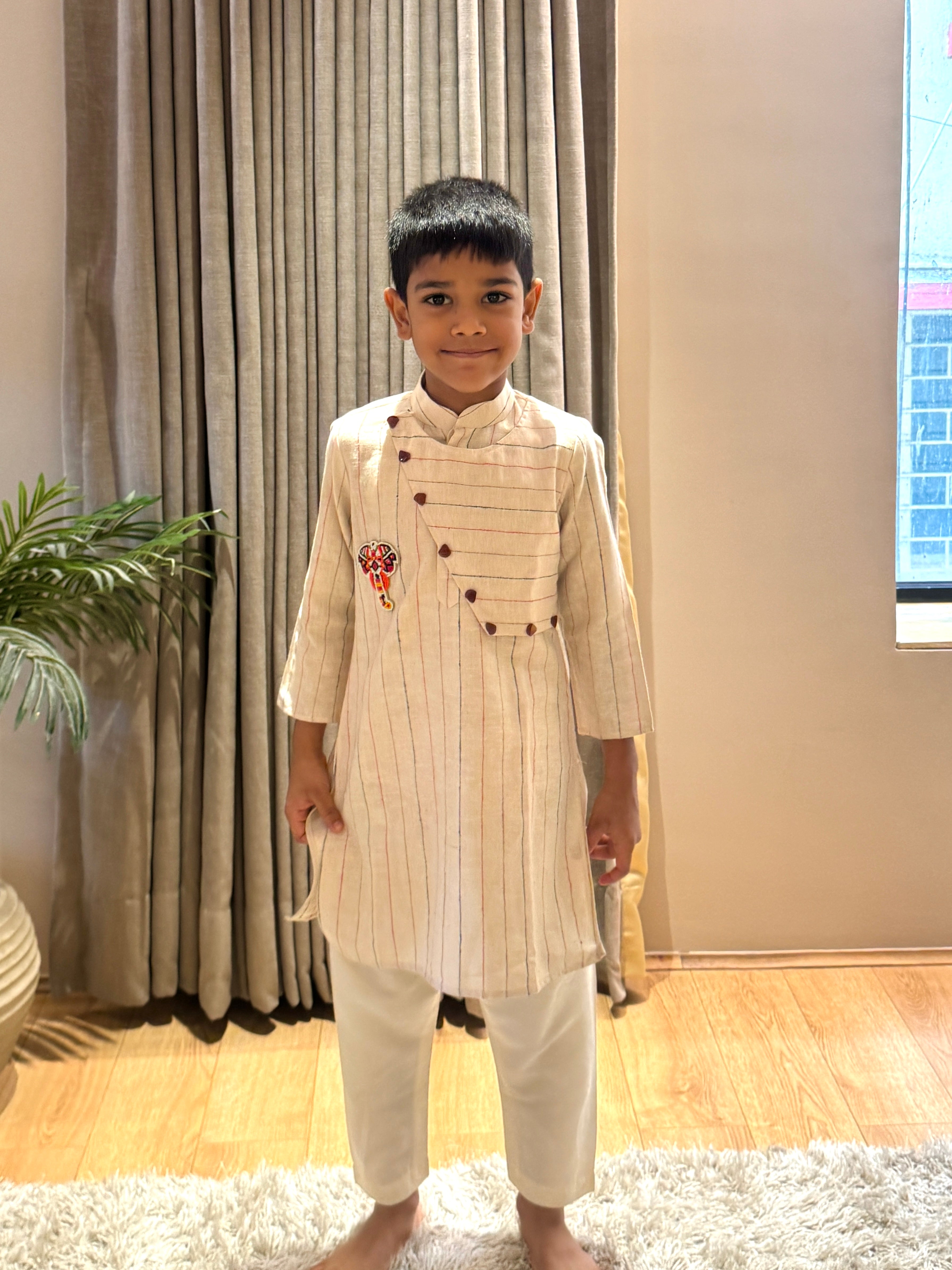 Kora Flap Kurta with Embroidery Motif