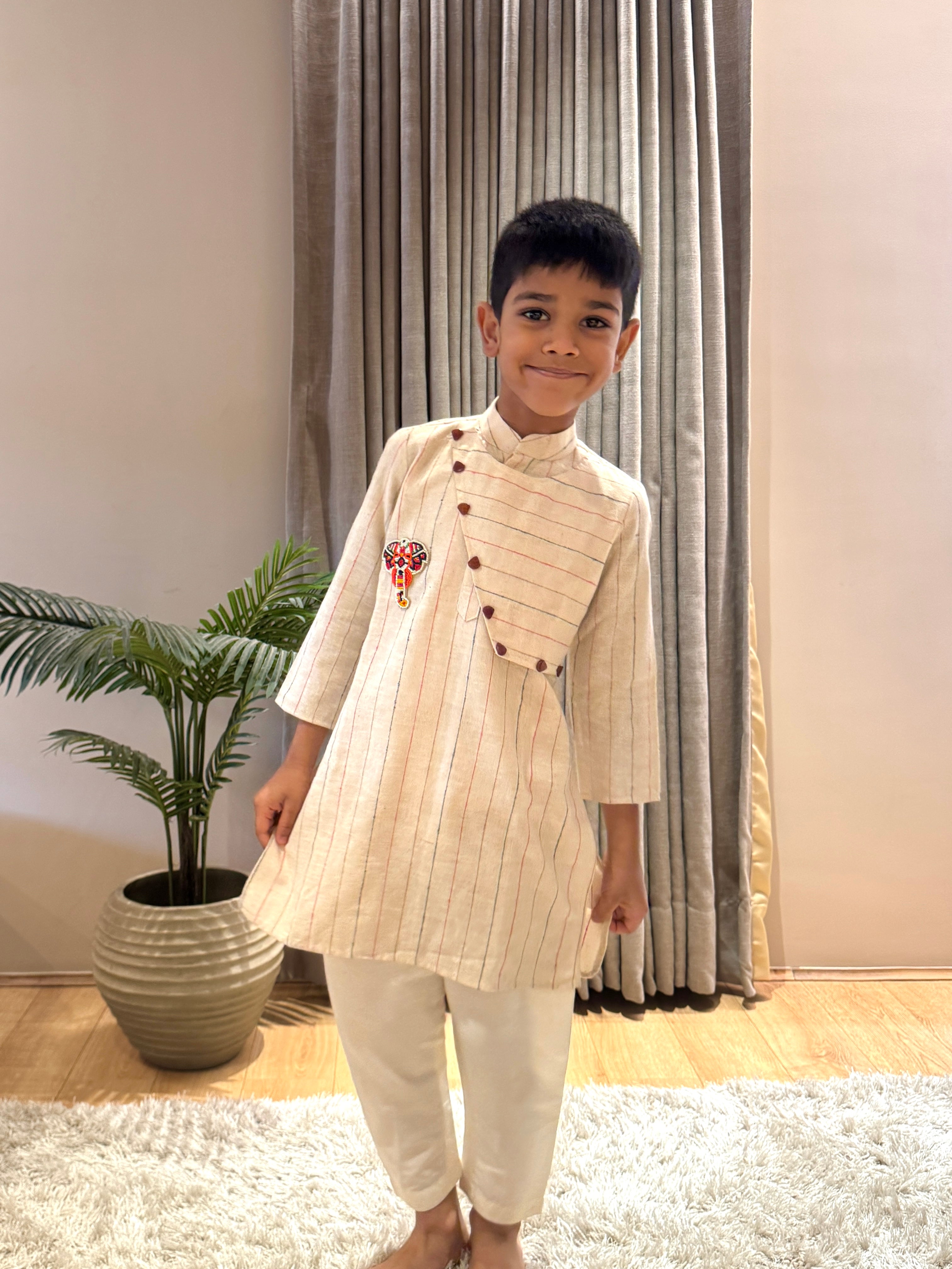 Kora Flap Kurta with Embroidery Motif