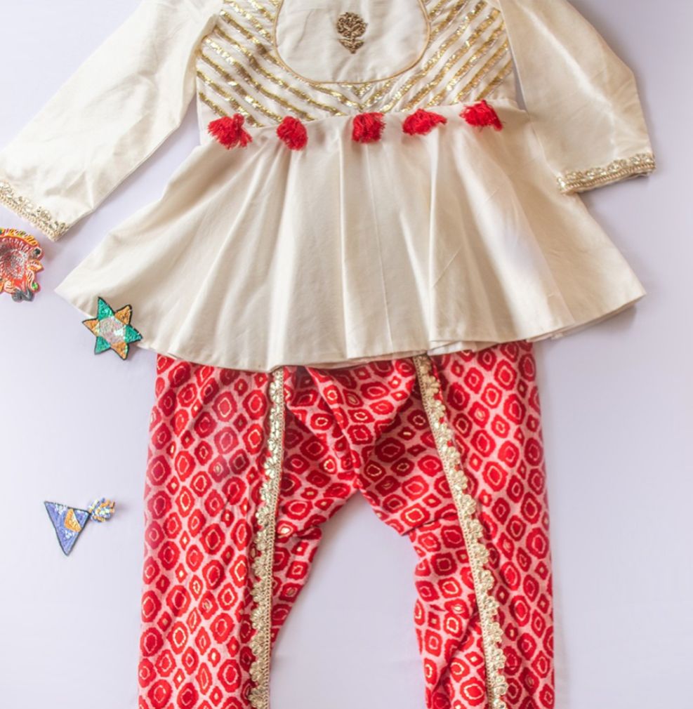 Off White Peplum Dhoti Set with Tassles
